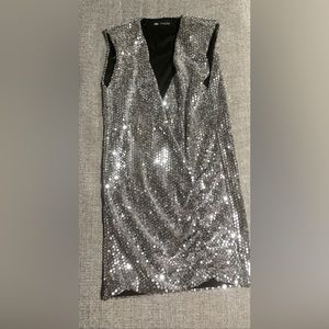 Silver sequins vest like dress.